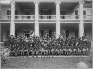 Carlisle Indian School Band Seated on Steps of a School Building, Carlisle, Pennsylvania, 1915 - NARA - 518927.jpg